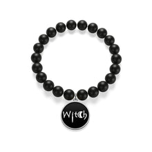 Load image into Gallery viewer, The word Witch in white creepy letters on a black Matte Onyx Bracelet