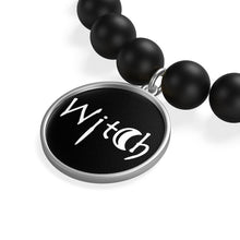 Load image into Gallery viewer, The word Witch in white creepy letters on a black bracelet