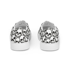 Load image into Gallery viewer, Covered in Skulls Women’s slip-on canvas shoes: Embrace Sinister Style and Comfort! 👻👟
