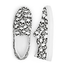 Load image into Gallery viewer, Covered in Skulls Women’s slip-on canvas shoes: Embrace Sinister Style and Comfort! 👻👟
